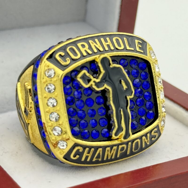 gold and blue cornhole championship ring