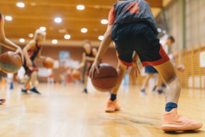 Group of Kids Training Basketball Together