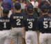 Four baseball kids facing away