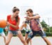 How to Display Your Championship Rings Like a True Champion - group of happy teenagers playing basketball outdoors