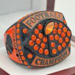 CLASSIC FOOTBALL CHAMPION RING --- BLACK BODY, ORANGE STONE (Item #51-92)