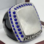 SQUARE ADD YOUR LOGO CHAMPION RING --- SILVER BODY, BLUE STONES, 2 ENGRAVABLE SIDES (Item #59-184)