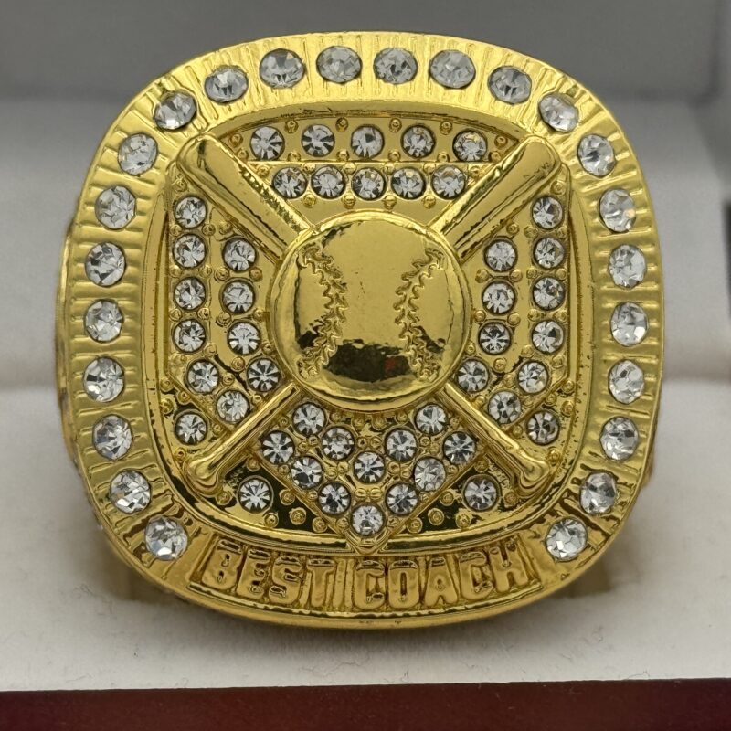 gold best coach ring with a baseball and 2 baseball bats