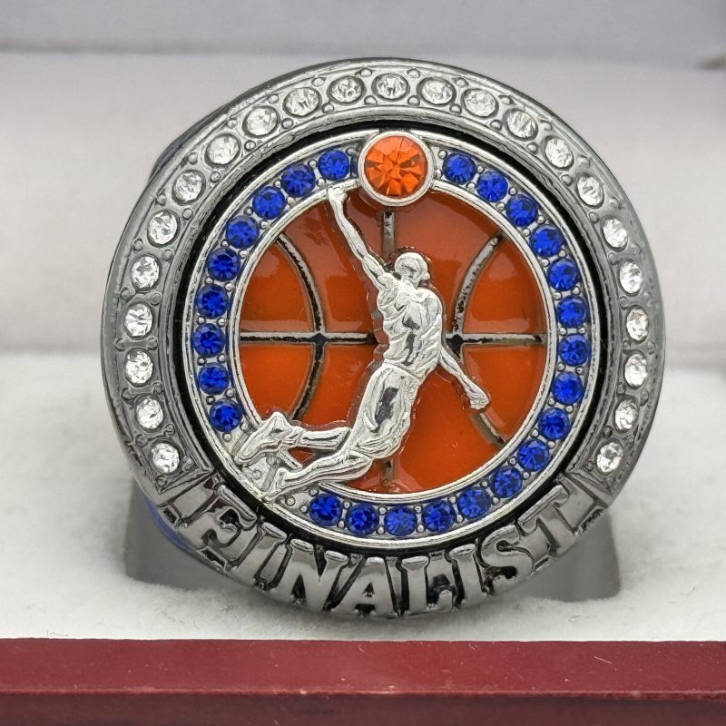 silver basketball finalsts ring with a player dunking