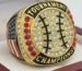 gold and black championship ring