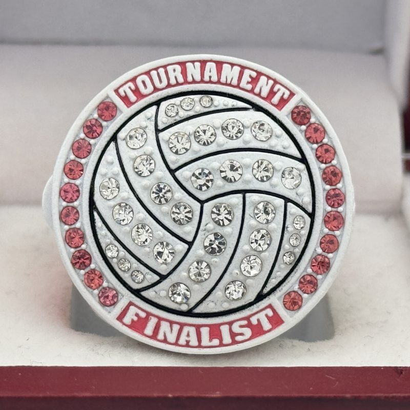 pink and silver volleyball championship ring