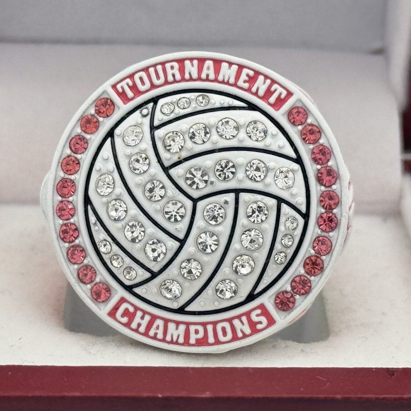 Pink tournament champions ring for volleyball