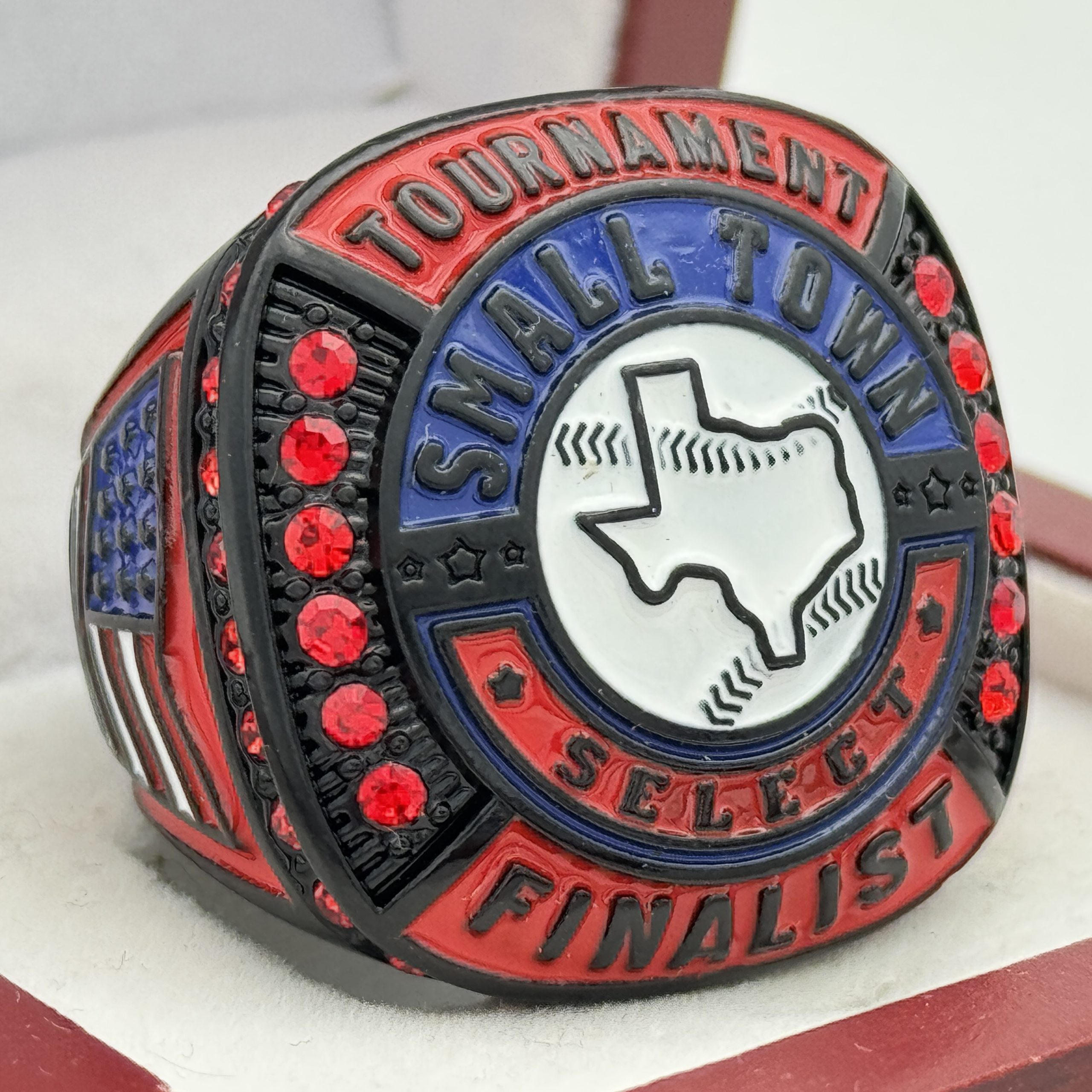 red and blue championship ring