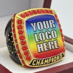 SQUARE ADD YOUR LOGO CHAMPION RING --- GOLD BODY, RED STONES, 2 ENGRAVABLE SIDES (Item #58-176)