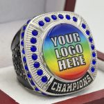 ROUND ADD YOUR LOGO CHAMPION RING --- SILVER BODY, BLUE STONES, 2 ENGRAVABLE SIDES (Item #59-172)
