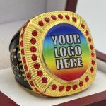 ROUND ADD YOUR LOGO RING --- GOLD BODY, RED STONES, 2 ENGRAVABLE SIDES (Item #58-188)