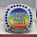 ROUND ADD YOUR LOGO CHAMPION RING --- SILVER BODY, BLUE STONES, 2 ENGRAVABLE SIDES (Item #59-172) - Image 3