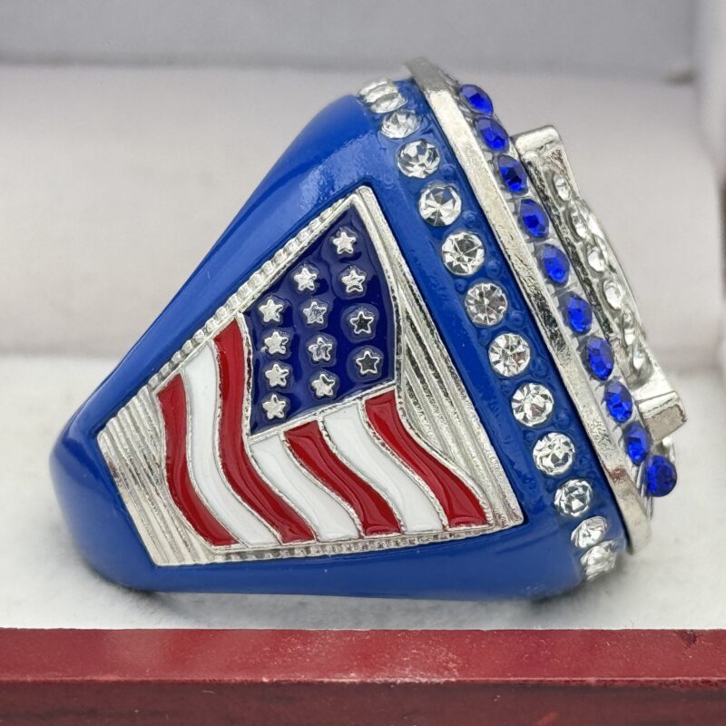side view of a championship ring with the american flag on the side