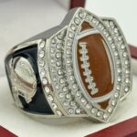 FOOTBALL PARTICIPATION RING --- SILVER BODY, PAINTED BALL (Item #55-157)