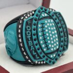 5 STAR LEGACY FOOTBALL CHAMPION RING --- BLACK BODY, TEAL SIDES (Item #51-132)