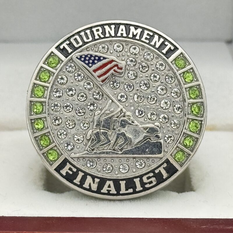 silver and green tournament finalist ring